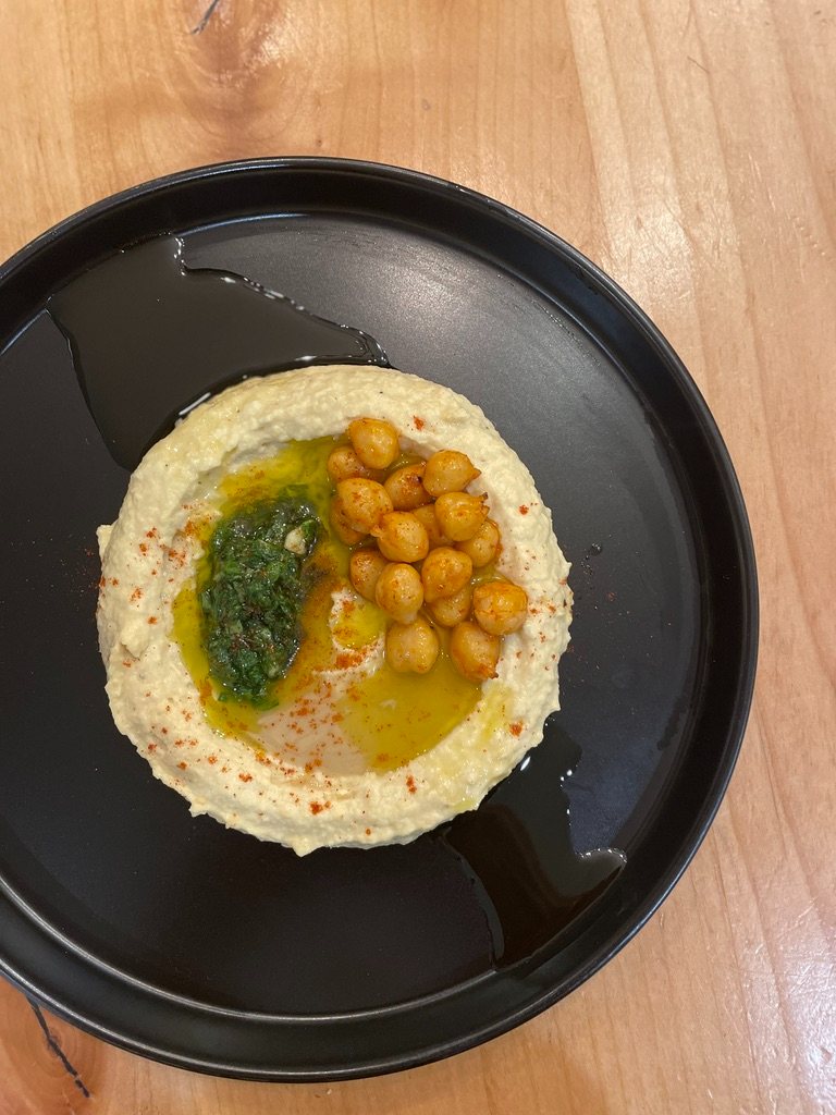 Hummus with crispy chickpeas and herb oil